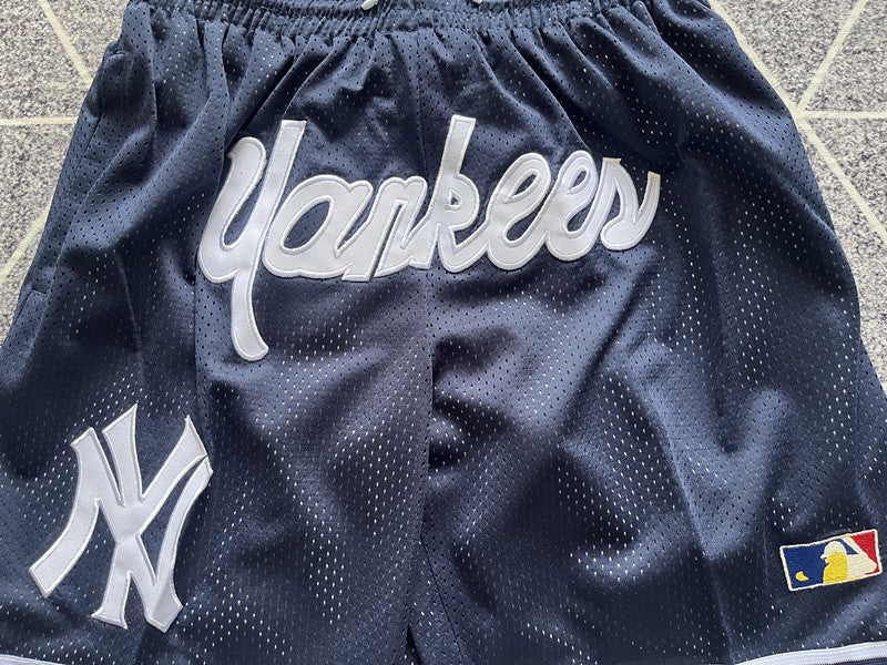 Navy New York Yankees premium basketball shorts, side panel detail