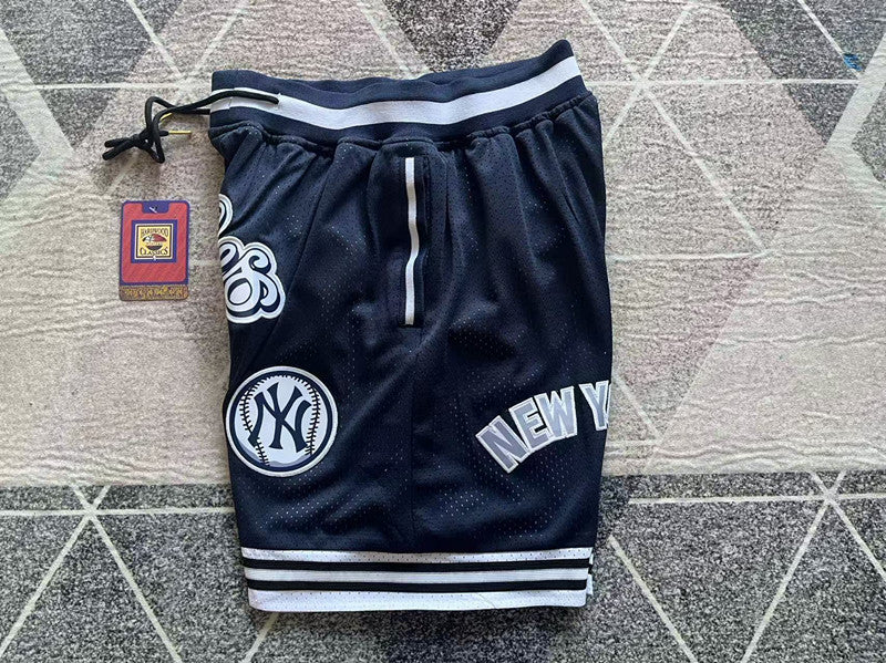 Navy New York Yankees premium basketball shorts, side panel detail