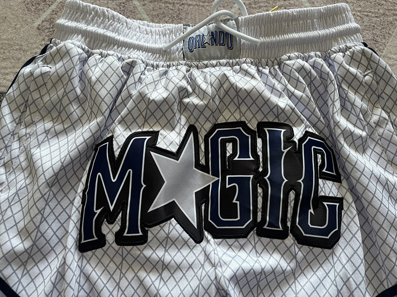 White Orlando Magic premium basketball shorts, waistband and label detail
