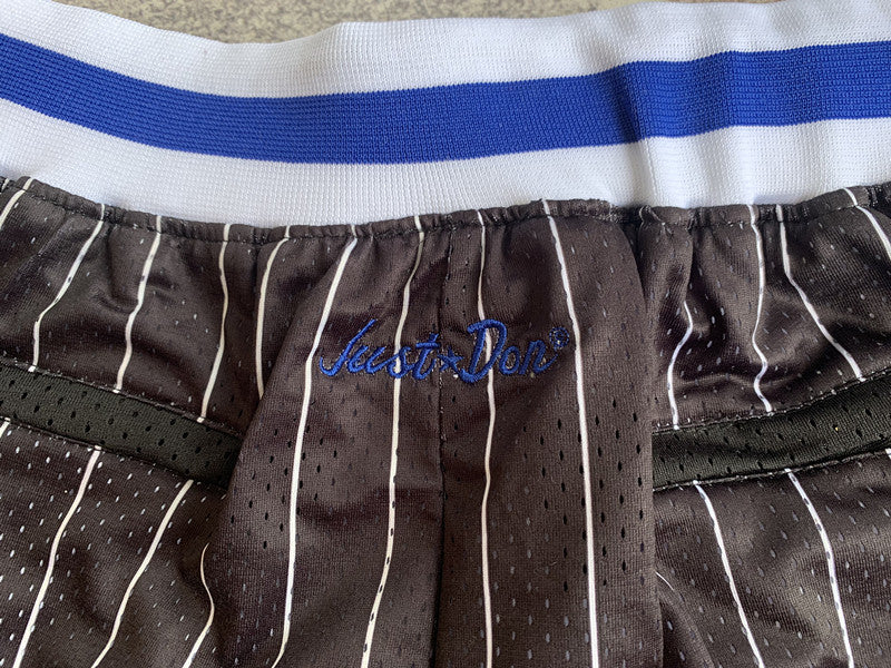 Black Orlando Magic premium basketball shorts, waistband and label detail