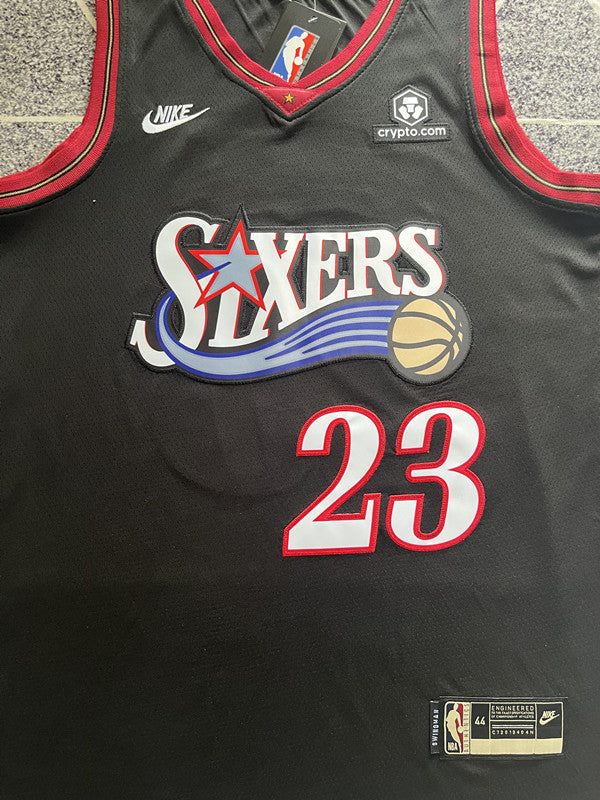 Black Philadelphia 76ers basketball jersey, front graphic detail