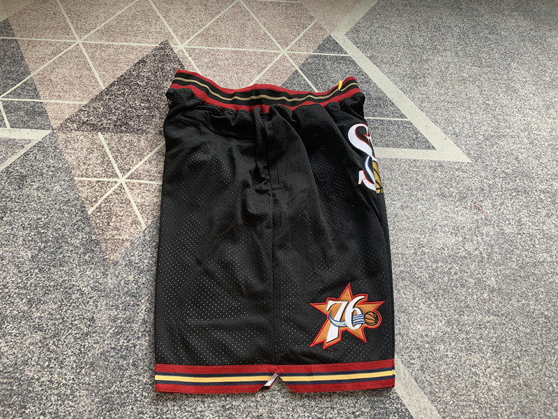 Black Philadelphia 76ers premium basketball shorts, side panel detail