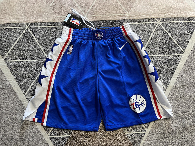 Blue Philadelphia 76ers basketball shorts, full front view