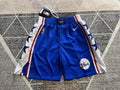 Blue Philadelphia 76ers basketball shorts, full front view
