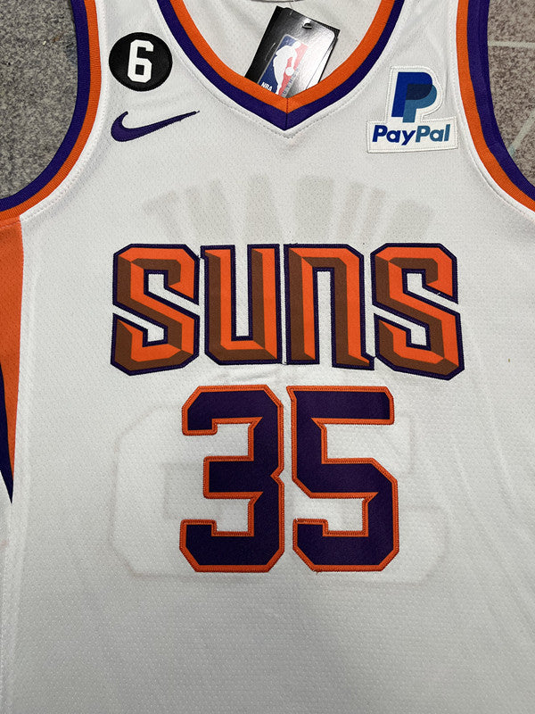 White Phoenix Suns basketball jersey, front graphic detail