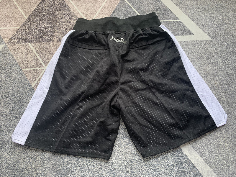 Black Las Vegas Raiders premium basketball shorts, full back view