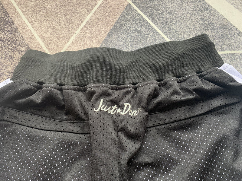 Black Las Vegas Raiders premium basketball shorts, waistband and label detail