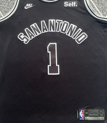 Black San Antonio Spurs basketball jersey, front graphic detail