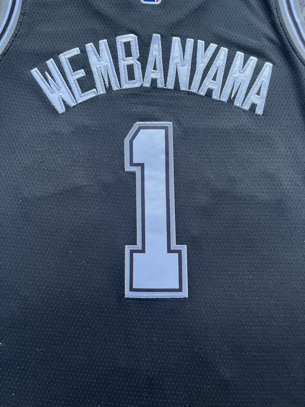 Black San Antonio Spurs basketball jersey, back lettering and number detail