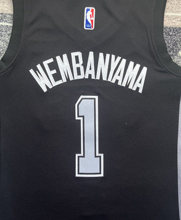 Black San Antonio Spurs basketball jersey, back lettering and number detail