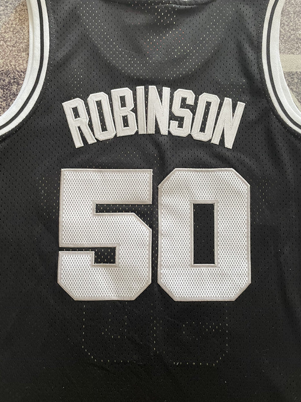 Black San Antonio Spurs basketball jersey, back lettering and number detail