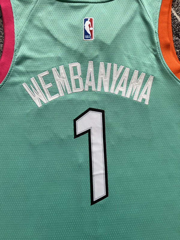 Green San Antonio Spurs basketball jersey, back lettering and number detail