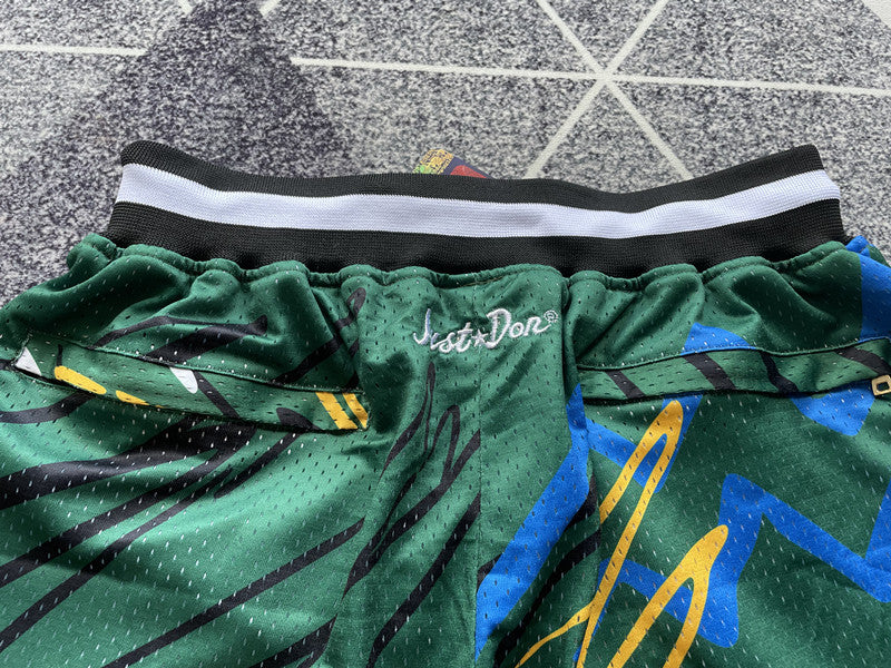 Green Seattle SuperSonics premium basketball shorts, waistband and label detail