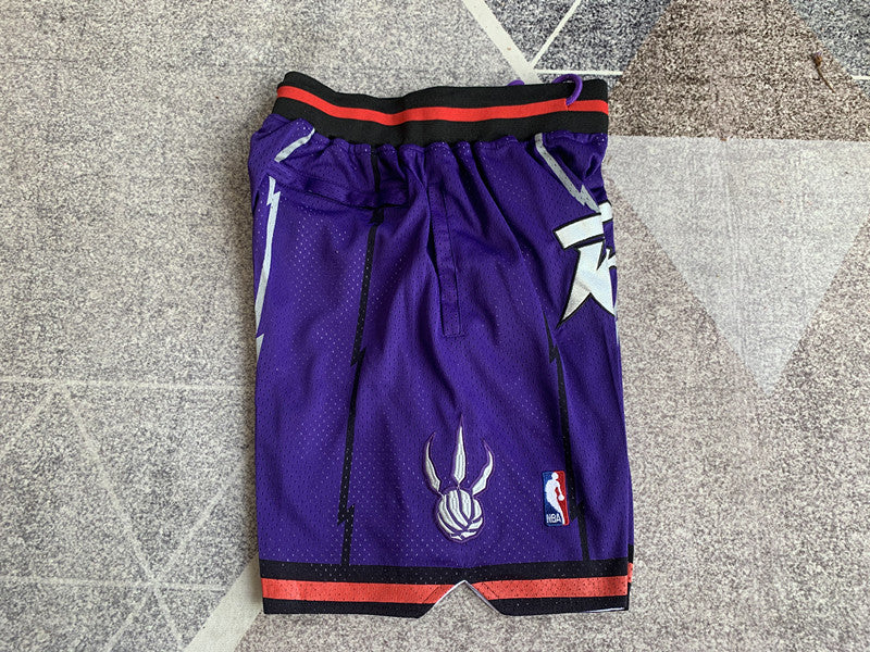 Purple Toronto Raptors premium basketball shorts, side panel detail
