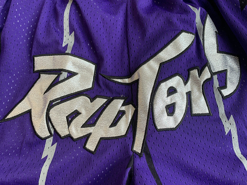 Purple Toronto Raptors premium basketball shorts, graphic detail