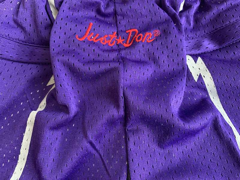 Purple Toronto Raptors premium basketball shorts, waistband and label detail