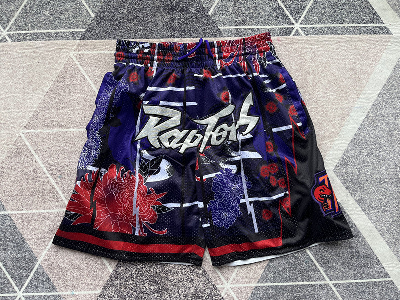 Purple Toronto Raptors premium basketball shorts, full front view