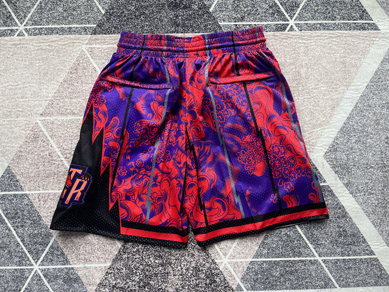 Purple Toronto Raptors premium basketball shorts, full back view