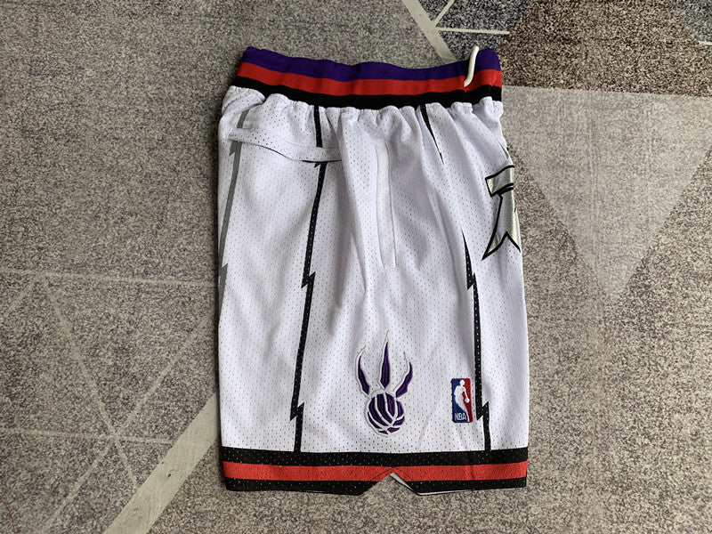 White Toronto Raptors premium basketball shorts, side panel detail