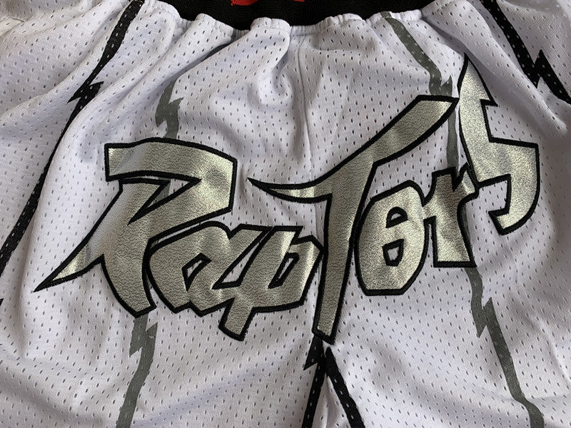 White Toronto Raptors premium basketball shorts, graphic detail