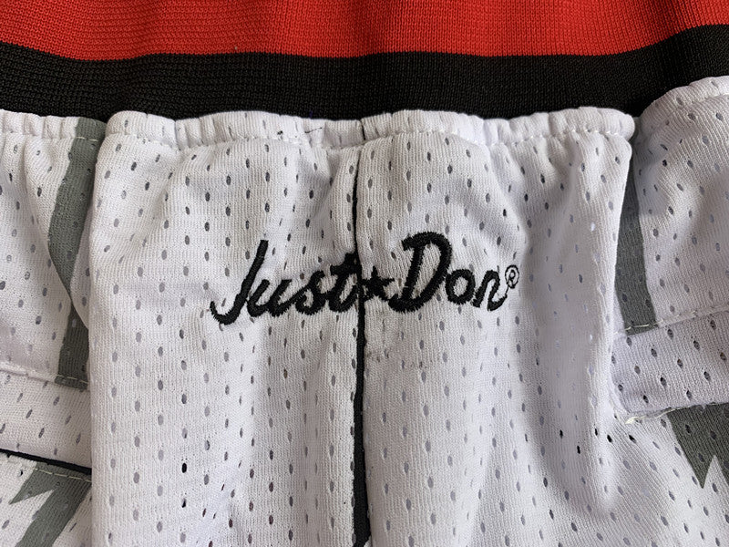 White Toronto Raptors premium basketball shorts, waistband and label detail