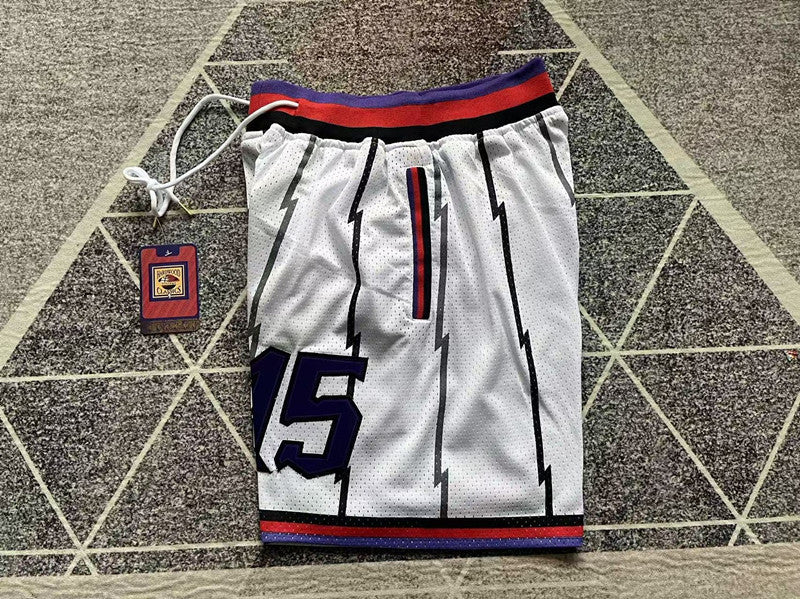 White Toronto Raptors premium basketball shorts, side panel detail