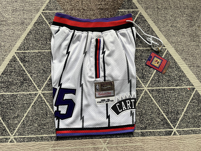 White Toronto Raptors premium basketball shorts, side panel detail