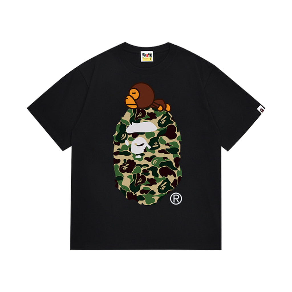 Black graphic T-shirt, green camouflage ape-head graphic with a small brown cartoon character, front view