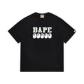 Black graphic T-shirt, bold white lettering above five small ape-head graphics, front view