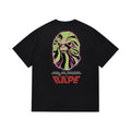 Black graphic T-shirt, large green and pink swirling ape graphic with red lettering, back view