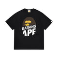 Black graphic T-shirt, brown and yellow ape graphic above stacked white lettering, front view