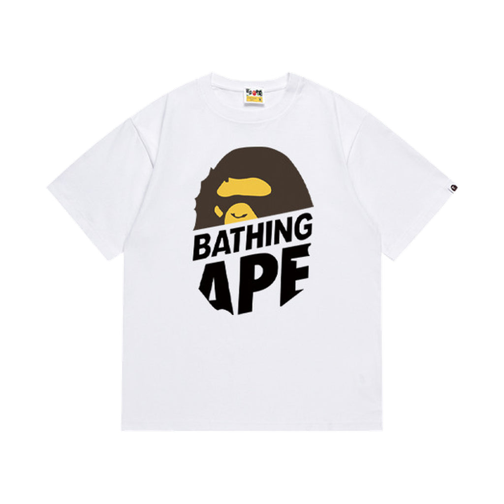 White graphic T-shirt, brown and yellow ape graphic above stacked black lettering, front view