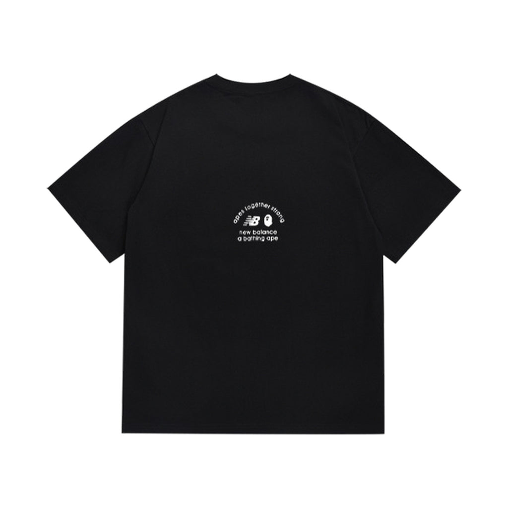 Black graphic T-shirt, small upper-back graphic, back view