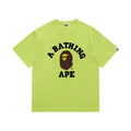 Lime Green graphic T-shirt, arched black lettering and brown and yellow ape-head graphic, front view