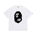 White graphic T-shirt, large black ape-head graphic with nb lettering, front view