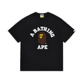 Black graphic T-shirt, arched white lettering and brown and yellow ape-head graphic, front view