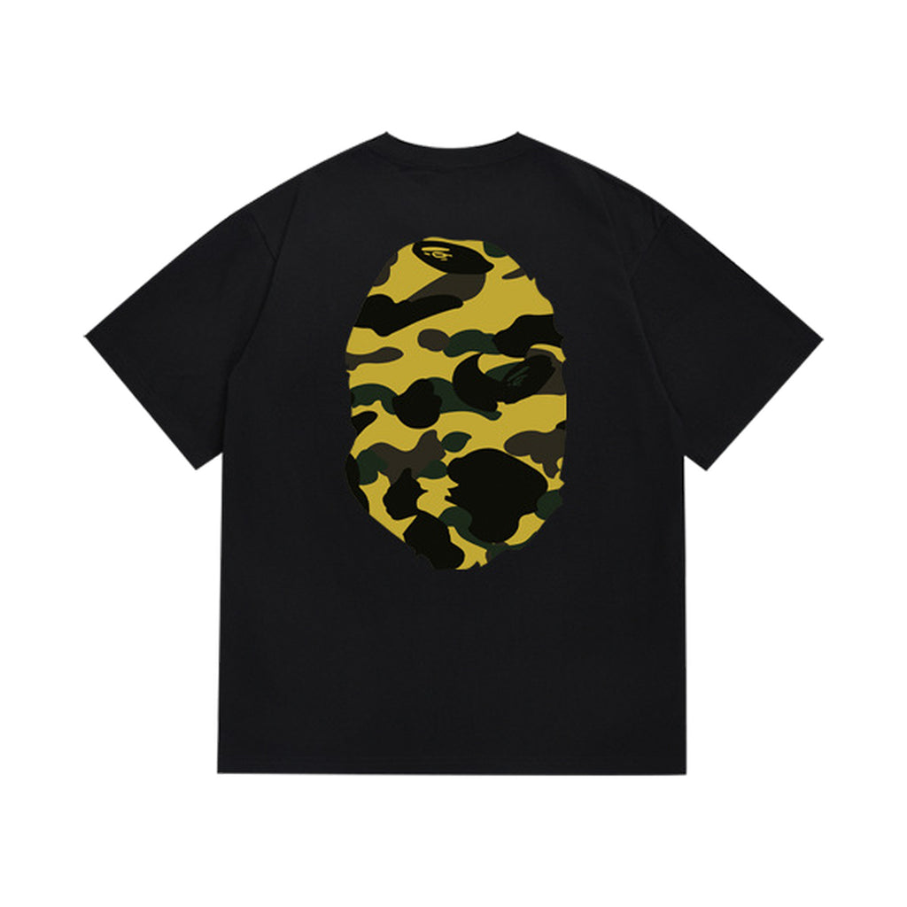 Black graphic T-shirt, large yellow and black camouflage ape-head graphics on front and back, back view