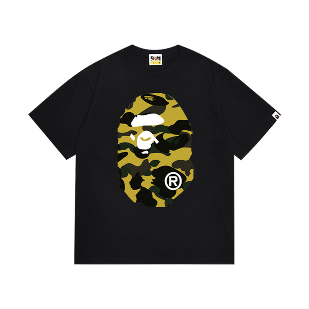 Black graphic T-shirt, large yellow and black camouflage ape-head graphics on front and back, front view