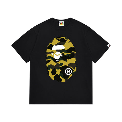 Black graphic T-shirt, large yellow and black camouflage ape-head graphics on front and back, front view