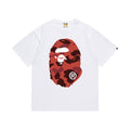 White graphic T-shirt, large red camouflage ape-head graphics on front and back, front view