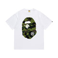 White graphic T-shirt, large olive and black camouflage ape-head graphics on front and back, front view