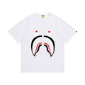 White graphic T-shirt, large red, black and white shark-face graphic, front view