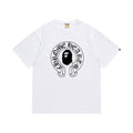 White graphic T-shirt, black gothic circular ape graphic on front and cross graphic with lettering on back, front view