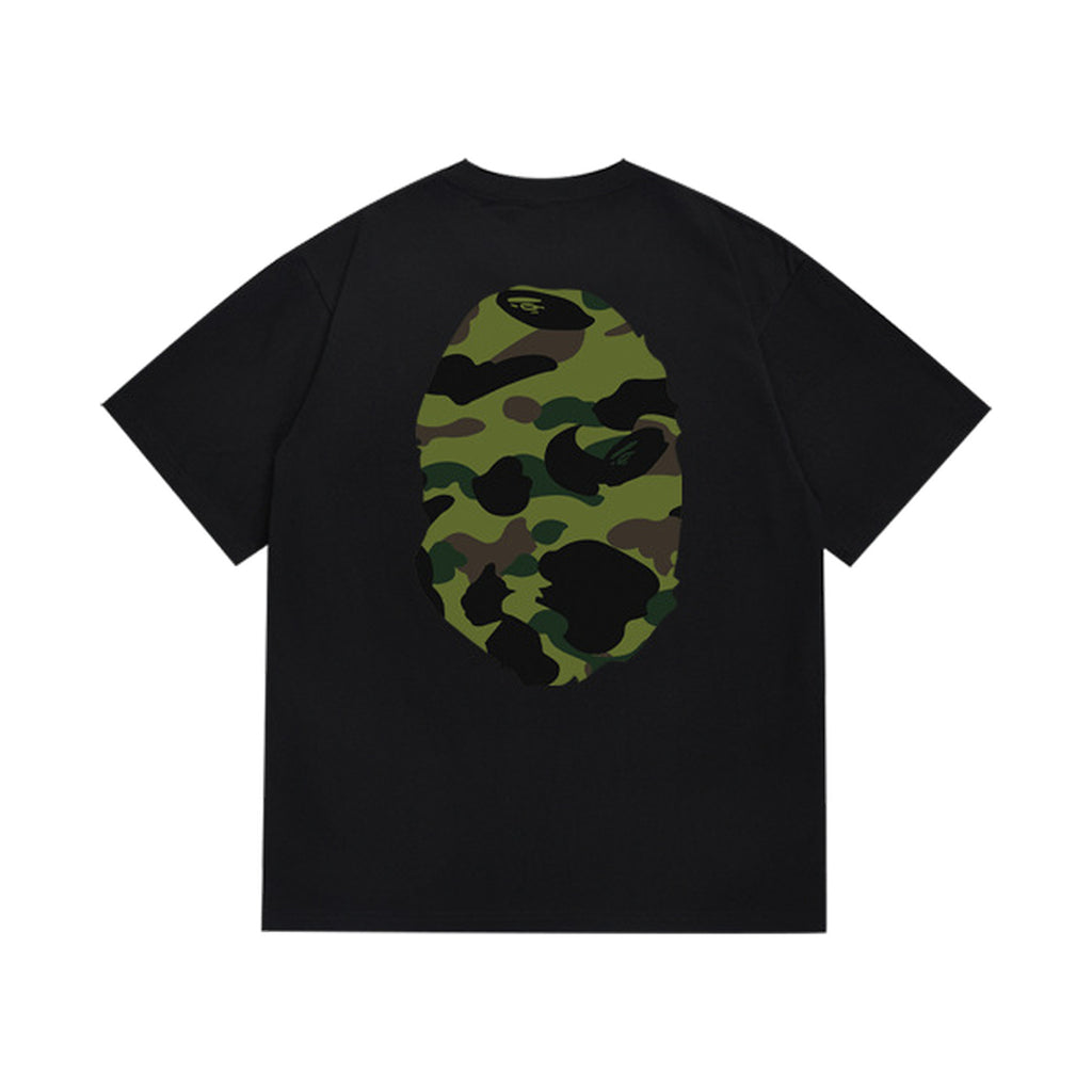 Black graphic T-shirt, large olive and black camouflage ape-head graphics on front and back, back view