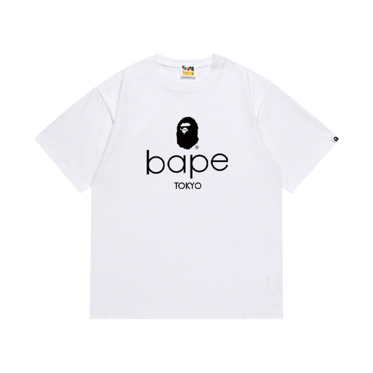White graphic T-shirt, black ape-head graphic above lowercase lettering and tokyo text, front view