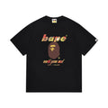 Black graphic T-shirt, brown and yellow ape-head graphic with multicolor lettering, front view