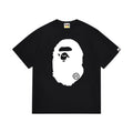 Black graphic T-shirt, large white ape-head front graphic and solid white ape-head silhouette on back, front view
