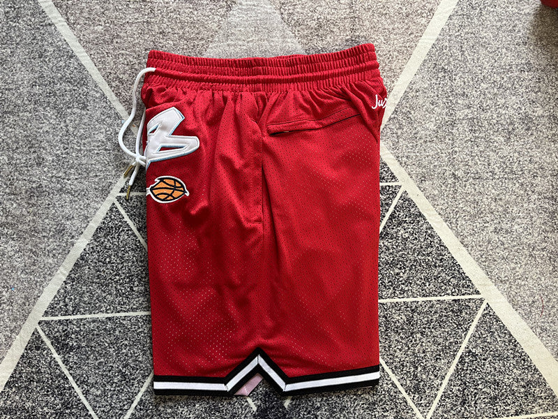 Red USA premium basketball shorts, side panel detail